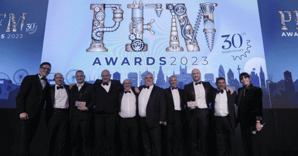 ASH Integrated Services team on stage at the PFM awards 2023