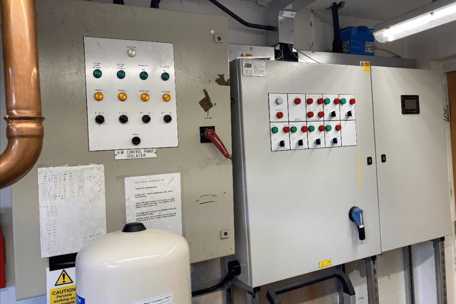 Heating distribution boards located within the electrical room. 