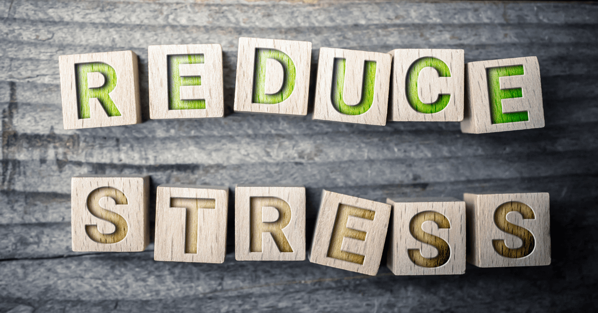 wooden blocks spelling out 'how to reduce stress'