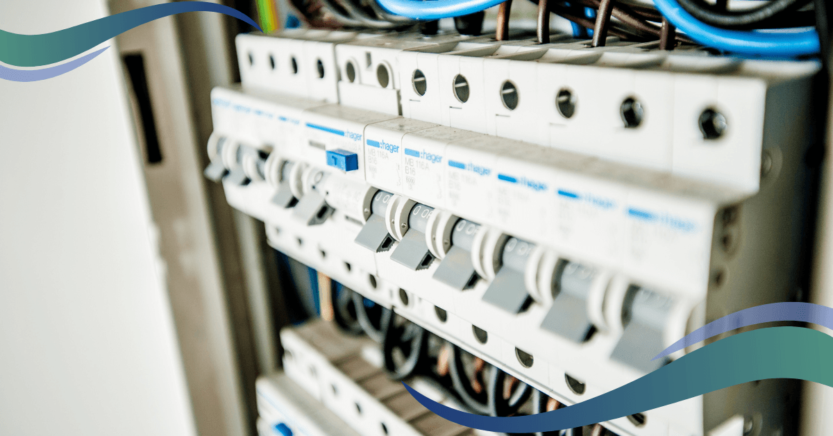 A close-up view of a modern electrical breaker box with multiple rows of switches and wiring.