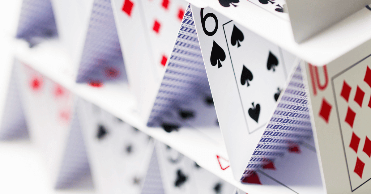 Image shows a house of cards
