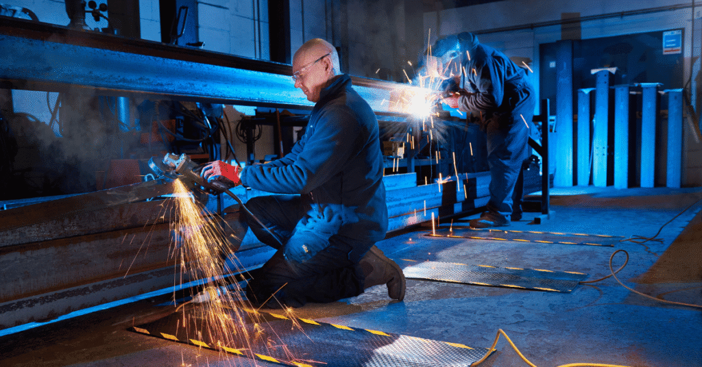 Image shows engineer fabricating