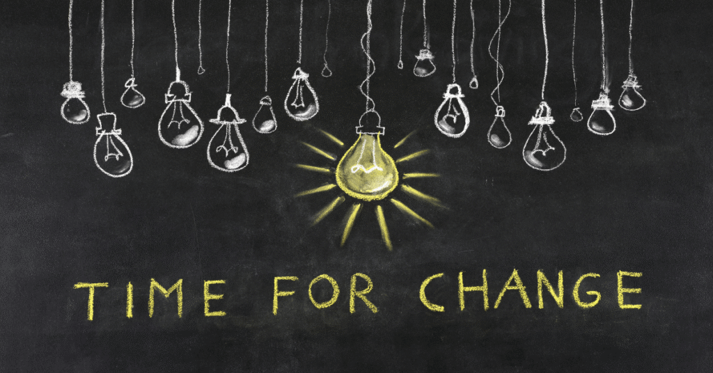 Image shows a string of lightbulbs and the words time for change