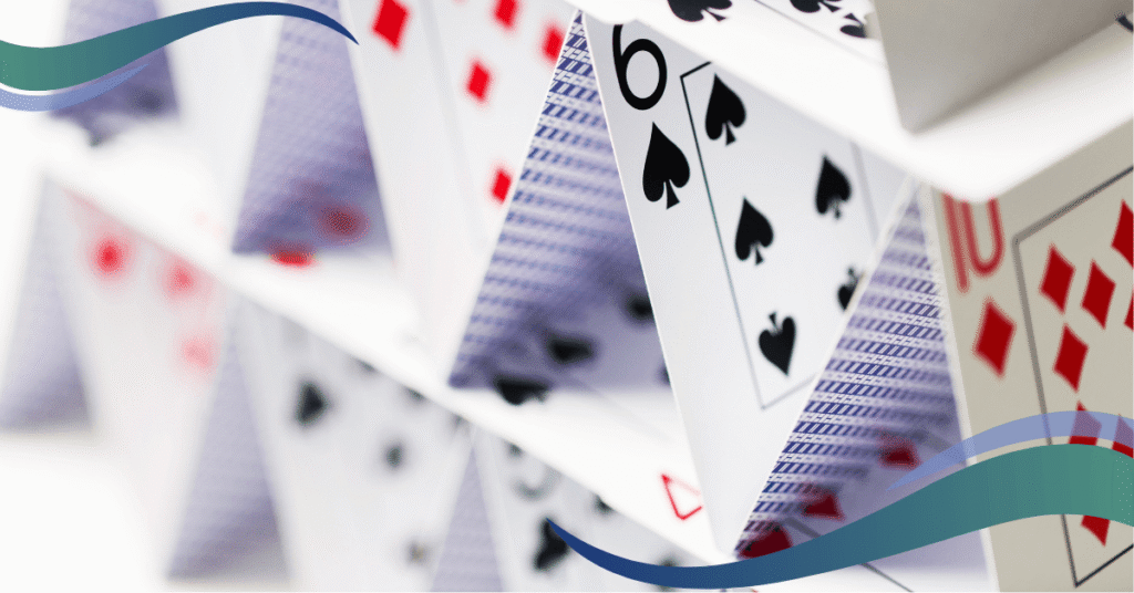 Image shows a house of cards